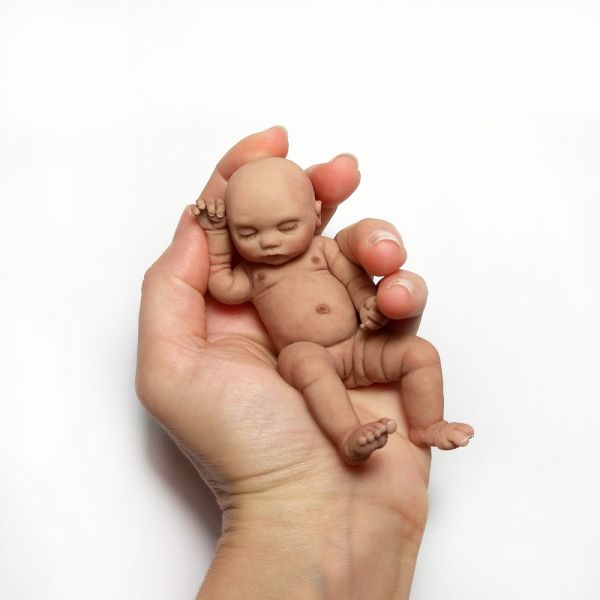 Solid silicone miniature sleeping ethnic baby girl 11,5 cm (4,6")